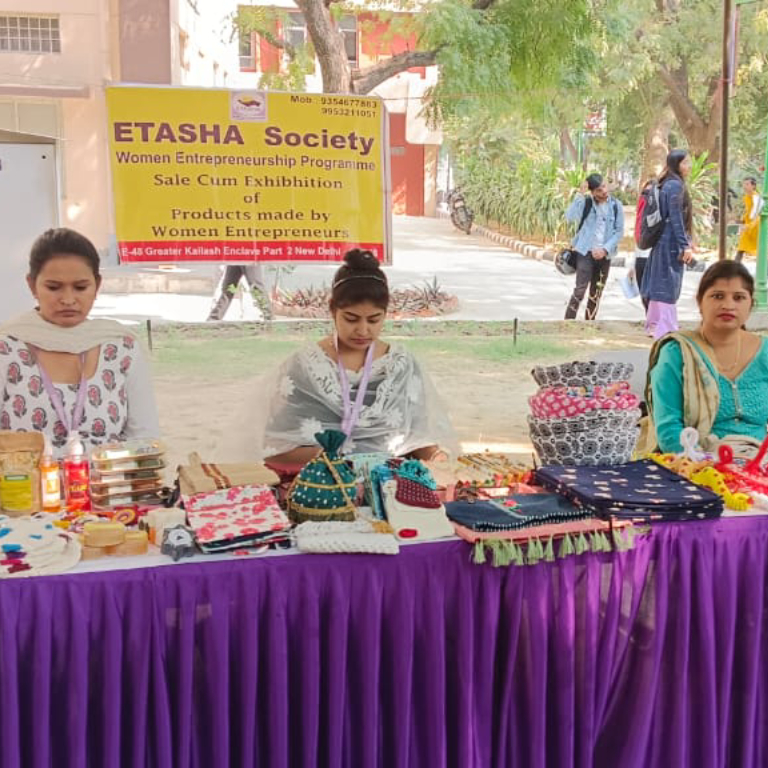 Women Entrepreneurs attending a sale cum exhibition of products made by them.