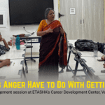ETASHA facilitator mapping anger triggers on a digital board during a youth employability session in Delhi